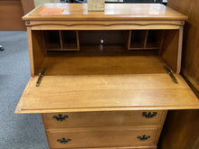 Load image into Gallery viewer, Used light oak secretary desk open showing writing surface and cubbies