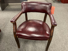 Load image into Gallery viewer, Used burgundy faux leather guest chair with brass nailhead trim