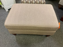 Load image into Gallery viewer, Used tan tweed ottoman with welt trim and dark wood legs